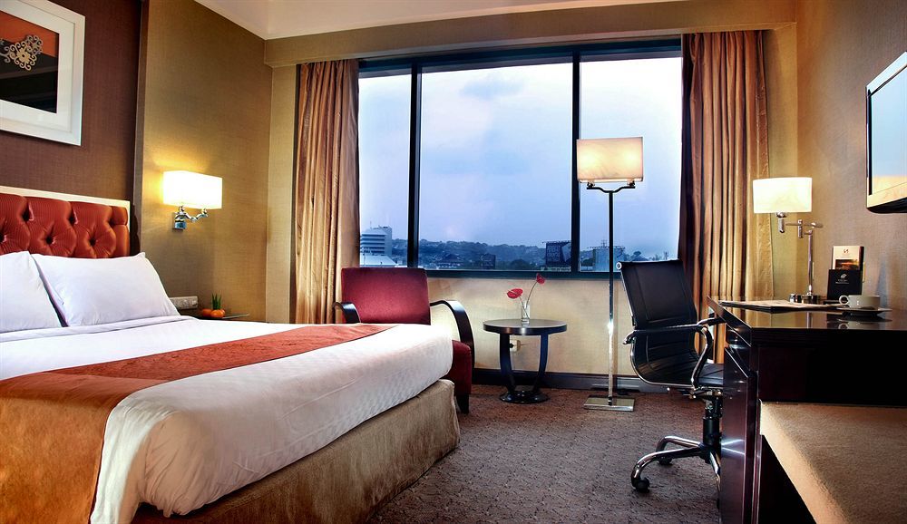 Hotel Ciputra Semarang Managed By Swiss-Belhotel International Quarto foto